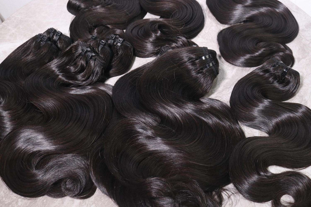 Raw hair bundle body wave natural color(1b) premium quality Vietnam factory light chemical processed straight style premium